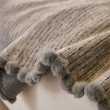 Stone Grey Corduroy sofa throw styled with cushions on a low-back sofa, view 5