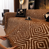 Auburn Brown Geometric Boho sofa throw seen from the side on a corner sofa, view 2