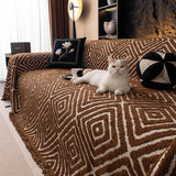 Auburn Brown Geometric Boho sofa throw seen from above across the seat, view 2