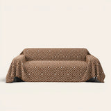 Auburn Brown Geometric Boho sofa throw on a plain studio background, view 2