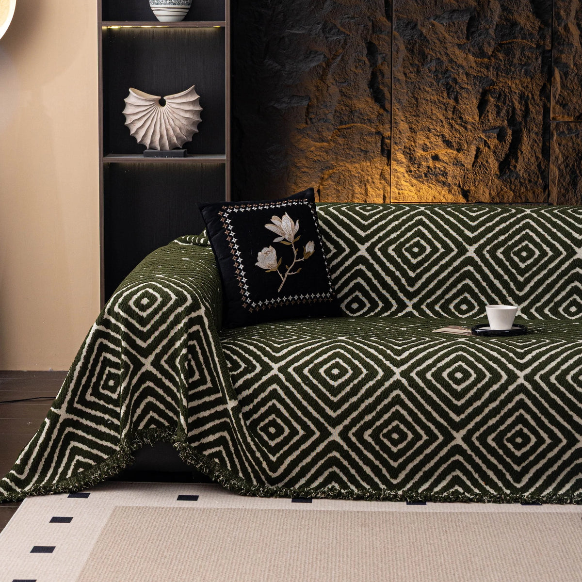 Forest Green Geometric Boho sofa throw draped over a three-seater sofa in a bright living room, view 4