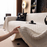Ivory Cream Geometric Boho sofa throw styled with cushions on a low-back sofa, view 3