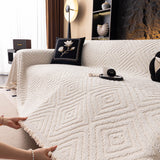 Ivory Cream Geometric Boho sofa throw covering the arm and seat of a sectional, view 3