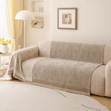 Caramel Linen Knit sofa throw covering the arm and seat of a sectional