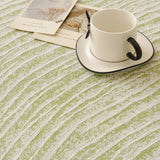 Forest Green Linen Knit sofa throw styled with cushions on a low-back sofa, view 3