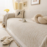 Khaki Linen Knit sofa throw seen from the side on a corner sofa, view 4