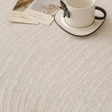 Oat Beige Linen Knit sofa throw shown across the seat and backrest of a two-seater