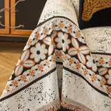 Ivory Cream Luxe Heritage sofa throw seen from the side on a corner sofa, view 2