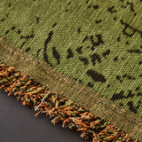 Olive Green Luxe Heritage sofa throw covering the arm and seat of a sectional, view 3