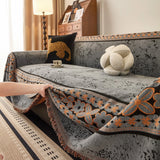 Pearl Grey Luxe Heritage sofa throw seen from the side on a corner sofa