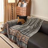 Pearl Grey Luxe Heritage sofa throw shown across the seat and backrest of a two-seater