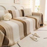Auburn Brown Metro Stripe sofa throw seen from the side on a corner sofa