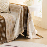 Auburn Brown Metro Stripe sofa throw covering the arm and seat of a sectional