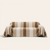 Auburn Brown Metro Stripe sofa throw on a plain studio background