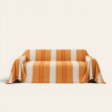 Orange Arrow Metro Stripe sofa throw on a plain studio background, view 4