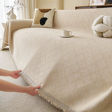 Ivory Cream Relief Weave sofa throw seen from the side on a corner sofa