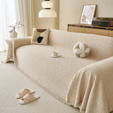 Ivory Cream Relief Weave sofa throw styled with cushions on a low-back sofa