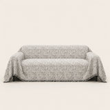 Pearl Grey Spotted sofa throw on a plain studio background, view 2