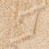 Warm Stone Tweed Knit sofa throw, woven texture in close-up