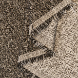 Charcoal Tweed Knit sofa throw covering the arm and seat of a sectional
