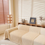 Khaki Tweed Knit sofa throw seen from the side on a corner sofa, view 4
