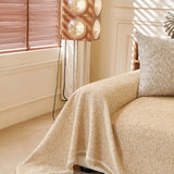 Khaki Tweed Knit sofa throw styled with cushions on a low-back sofa, view 3