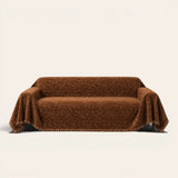 Auburn Brown Velvet Embossed sofa throw on a plain studio background