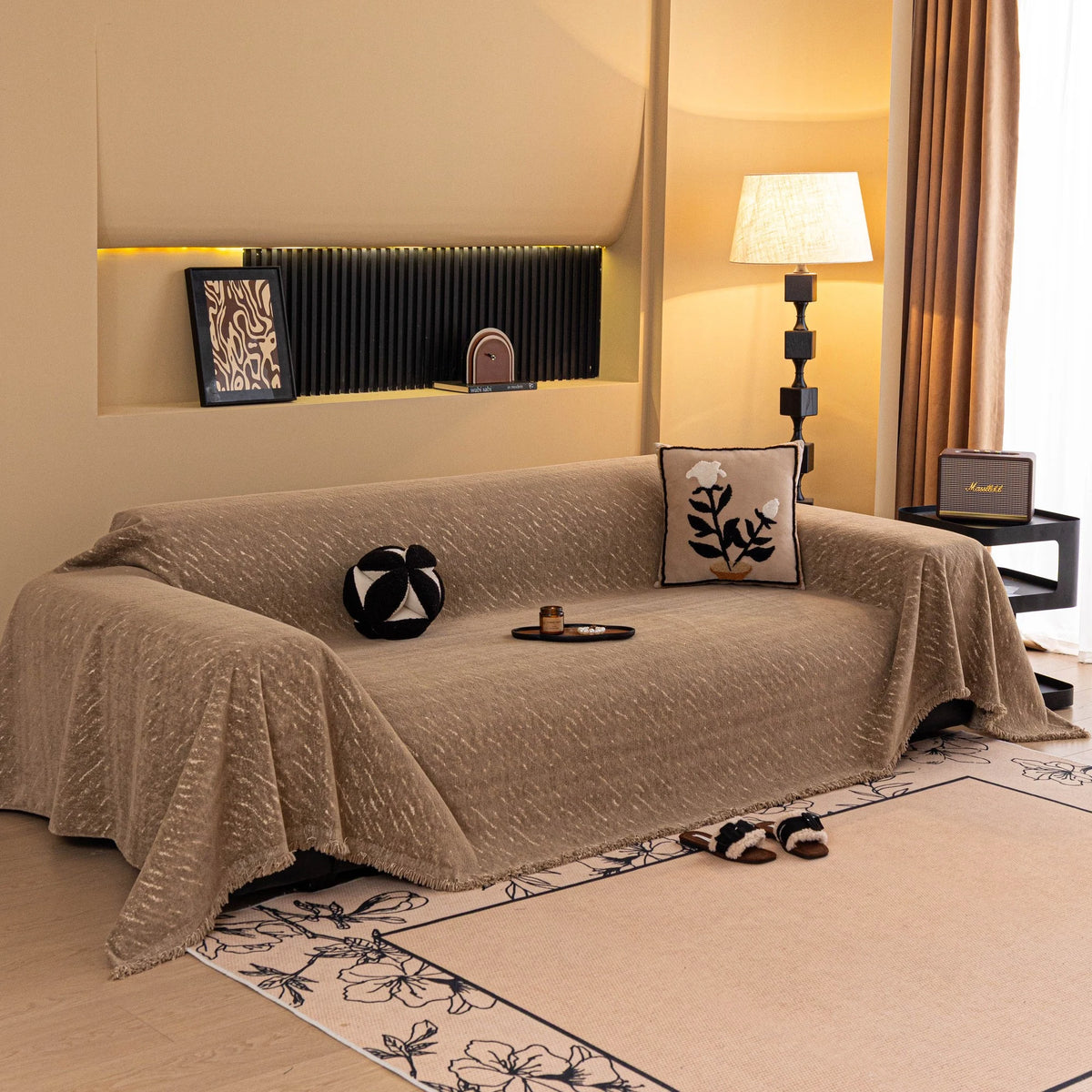 Boucle-Style Sand Velvet Embossed sofa throw draped over a three-seater sofa in a bright living room, view 4