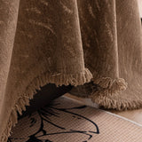 Boucle-Style Sand Velvet Embossed sofa throw seen from the side on a corner sofa, view 4