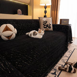 Ink Black Velvet Embossed sofa throw shown across the seat and backrest of a two-seater, view 3