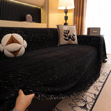 Ink Black Velvet Embossed sofa throw covering the arm and seat of a sectional, view 3