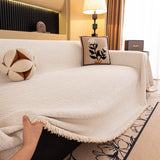 Ivory Cream Velvet Embossed sofa throw seen from the side on a corner sofa, view 2