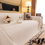 Ivory Cream Velvet Embossed sofa throw spread across a sofa in daylight