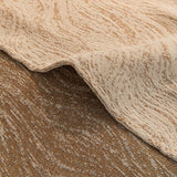 Boucle-Style Sand Wave Quilted sofa throw styled with cushions on a low-back sofa, view 2