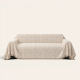 Boucle-Style Sand Wave Quilted sofa throw on a plain studio background, view 2
