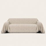 Stone Grey Wave Quilted sofa throw on a plain studio background, view 3