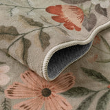 Covaba boho modern parisian floral scalloped rug in coffee brown, styled in a room setting