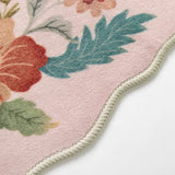 Covaba boho modern parisian floral scalloped rug in soft blush, styled in a room setting, view 2