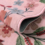 Covaba boho modern parisian floral scalloped rug in blush clay, styled in a room setting