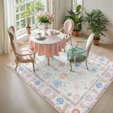 Covaba boho oushak floral area rug in blush clay, styled in a room setting, view 9