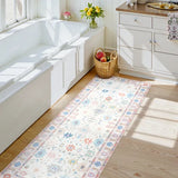 Covaba boho oushak floral runner rug in blush clay, styled in a room setting, view 2