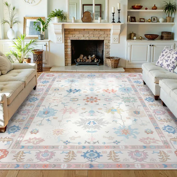 Covaba boho oushak floral area rug in blush clay, styled in a room setting