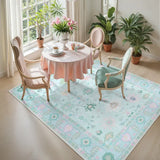 Covaba boho oushak floral area rug in teal haze, styled in a room setting, view 8