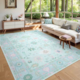 Covaba boho oushak floral area rug in teal haze, styled in a room setting, view 2