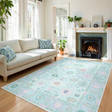 Covaba boho oushak floral area rug in teal haze, styled in a room setting, view 5