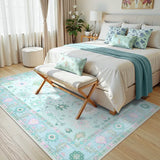 Covaba boho oushak floral area rug in teal haze, styled in a room setting, view 6