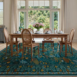 Covaba modern botanical floral area rug in stormy blue, styled in a room setting, view 8