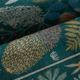 Covaba modern botanical floral rug in stormy blue, styled in a room setting