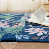 Covaba modern tropical bird runner rug in stormy blue, styled in a room setting, view 7