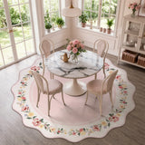 Covaba vintage floral scalloped round rug in blush clay, styled in a room setting, view 2